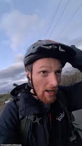 Terrifying moment British cyclist is chased down by TWO pitbulls who show  off their incredible pace as they keep up with his bike and try to bite him 