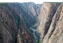 Putting gravels or river rock in an area where grass doesn't grow is an inexpensive way to make your muddy back yard look a little more stylish! The Geological History Of The Black Canyon Of The Gunnison