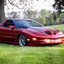 Image result for Sunset Orange 2001 Pontiac