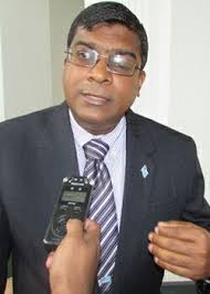 Where is the PNG Education Minister in Parliament?