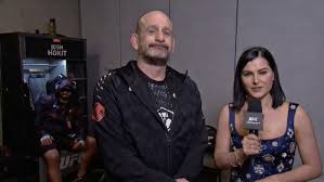 UFC's Megan Olivi explains approach to locker room coach interviews