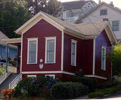 Burgundy Red Beige And Blue Victorian House Astoria Oregon Red House Exterior Blue Victorian House Red Houses