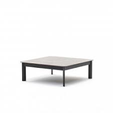 With room for two chairs, cafe tables make a chic spot for sunrise breakfasts and light dinners, yet their compact design also leaves plenty of room for outdoor activities. Outdoor Coffee Table Barthome