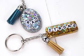 Arrives by mon, nov 29 buy 100 pcs porcelain letter beads jewelry making kit with wax cord and keyrings in black and white at walmart.com. Glitter Resin Keychains With Power Words Diy Resin Crafts Blog By Eti