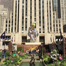 Check Out Seated Ballerina Jeff Koons Newest Giant Inflatable Sculpture At Rockefeller Center Viewing Nyc