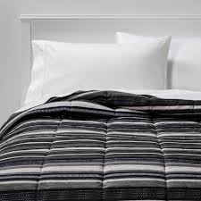 Adorned with black and white stripes, this designer king comforter creates an appealing look on your king bed that will command attention in your luckily, this white and black king xl comforter feels great too! Microfiber Stripe Reversible Comforter Room Essentials Target