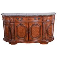 The antique marble top sideboard will be used to store silver ware, eating and other eating utensils. Drexel Heritage French Carved Burled Walnut Marble Top Sideboard Credenza At 1stdibs