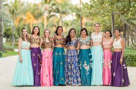 Olive green attractive plain kurta suit complemented with white shalwar additional. What To Wear As An Indian Wedding Guest Riya Collective