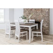 With a wide range of round, square and extending dining tables available in glass, marble, gloss and wood, we know you'll find the perfect option to suit your lifestyle. Hever Dining Table With 6 Chairs In White And Dark Pine Noa Nani