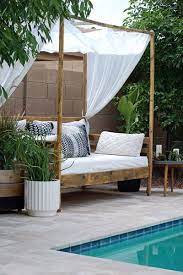 After following our instructions for how to build the cabana, add your own personal touch with outdoor lighting, curtains, pillows, plants, and other accessories. Diy Outdoor Daybed A Hint Of Home Outdoor Daybed Diy Diy Outdoor Daybed Outdoor Daybed