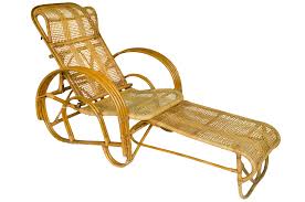 offered is a vintage rattan bamboo reclining lounge chair with built in ottoman a lightweight easily movable chair four vintage furniture lounge chair rattan