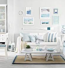 One of the easiest ways to give a bedroom a beach or ocean theme is with bedding. Soft Blue White Decor Ideas To Turn Your Living Room Into A Bright Happy Beach Oasis Beach Bliss Living