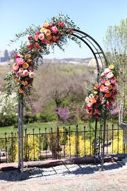 Waterfront wedding ceremony with floral arch at timber cove resort in jenner, california. Floral Verde Llc Ceremony