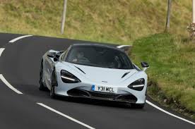 The dual exhaust ports exit near the top of the vehicle. Top 10 Best Supercar 2021 London News Time