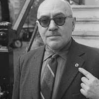 SGT. G. McNoun, a still photographic technician assigned to the 833rd  Combat Support Group, takes a photo in the portrait studio