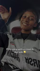 Black Girl in Car Seat with Mom and Dad in The Car