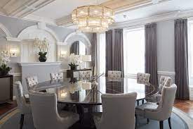 Long black dining table with baccarat lighting and ornate moldings. A Newly Minted Mansion Lists For Over 46 Million Wsj