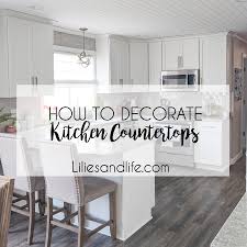 Had we placed objects up there, do you see how they would have distracted the eye from the island and those gutsy light fixtures? How To Decorate Your Kitchen Countertops Lilies And Life Interior Decorating Blog Home Decor Diy