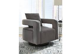 Polished chrome metal round base for design and durability. Alcoma Swivel Accent Chair Ashley Furniture Homestore