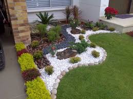 You can consider using these decoratively or as a building material. Round Garden Stones Front Yard Garden Design Small Front Yard Landscaping Rock Garden Landscaping