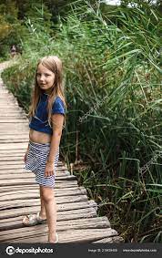 Cute Little Girl Lake Stock Photo by ©anastasia.goryainova 219429408