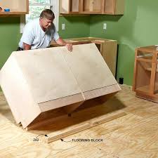 Use 2x2s To Secure Cabinets To The Floor Install Cabinets Like A Pro Http Www Famil Installing Kitchen Cabinets Installing Cabinets Kitchen Wall Cabinets