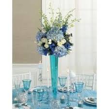 A rustic americana style wedding at storm pointe in goose creek, south carolina. Reception Centerpiece Blue Centerpieces Blue Wedding Centerpieces Elegant Wedding Centerpiece