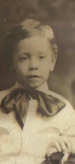 young Frank Costello pictured with his parents, father Luigi Castiglia  Costello and mother Maria Saveria Aloise Costello around 1910