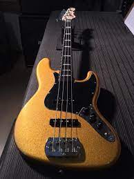 A Jb In Pharaoh Gold Firemist Over Empress 3 Ply Black Guard Ebony Board Clear Satin Neck Finish Pearl Block Inlays Bass Guitar Guitar Bass