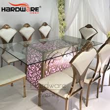 We may earn commission on some of the items you choose to buy. Modern Design Tempered Glass Top Stainless Steel Dining Table 10 Chairs Set China Stainless Steel Dining Table Hotel Chair Made In China Com