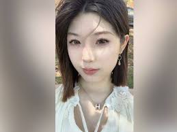 Vigil for Chinese student killed at unit block