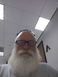 Little miss Katie sitting in the bus pretending to talk