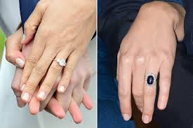 Princess eugenie of york's sapphire engagement ring is rarer than catherine, duchess of cambridge's (kate middleton) from diana, princess of to refresh your memory, kate's engagement ring consists of a 12 carat oval blue ceylon sapphire, surrounded by a halo of 14 solitaire diamonds. The Rings The Dresses Comparing Meghan Markle And Kate Middleton S Engagement Photos Royal Engagement Rings Kate Middleton Engagement Ring Meghan Markle Engagement Ring