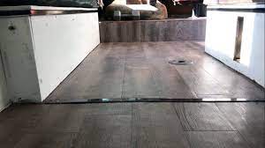 Peel and stick tiling sticks wonderfully to floors made of wood or concrete but you will need to do a little more preparation for other materials or if your flooring is not in good condition. Motorhome Floor Renovation Diy Peel And Stick Vinyl Flooring 1972 Winnebago Brave Youtube