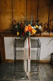 I throughly enjoy the art of floral design. Intimate Autumnal Springfield Mo Forest Wedding At Rockspan Lodge Junebug Weddings