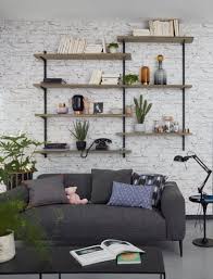 Envie De Donner Un Air De Loft New Yorkais A Votre Interieur Misez Sur Des Coussins Graphiques Papier Peint Brique Blanche Brique Blanche Papier Peint Brique