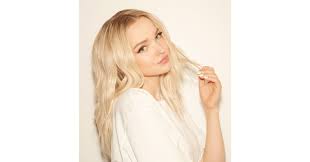 Dove cameron has had platinum hair for so long, you might assume it's her natural hair color. Dove Cameron Joins Finishing Touch Flawless Brand As Ambassador