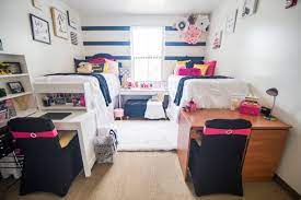 This Nike Room Gives Us A Victoria S Secret Vibe Ucf Dorm Dorm Life Dorm Room