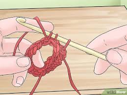 Rub the waxed paper along the length of the dowel, around the hook you made and over the wooden finial. How To Tunisian Crochet In The Round With Pictures Wikihow