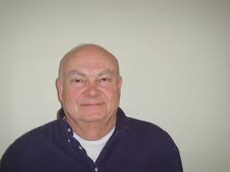 What is the make and model of the car in the foreground?