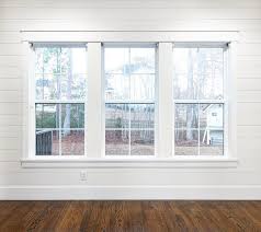 When we had some windows replaced last year, the fitters installed some upvc trim around the inner window to cover over gaps between the reveals and the windows and the cill and the windows. Philip Or Flop On Instagram Shiplap I Spent The Weekend Replacing The Window Trim On Two Big Triple Windows An Window Trim Windows Triple Window Living Room