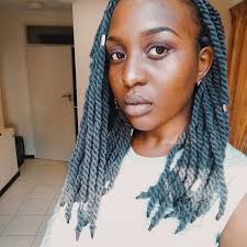 Weave hairstyles do not have to be a single color but can combine lowlights and highlights like this fantastic combination of blue hair color. The Coolest Yarn Braids To Inspire Your Next Protective Style Naturallycurly Com
