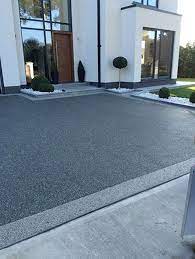 Give your driveway a rich, premium look by laying it in smooth lines. 008 After Resin Bound Driveways Uk Jpg 602 800 Driveway Design Modern Driveway Front Garden Ideas Driveway
