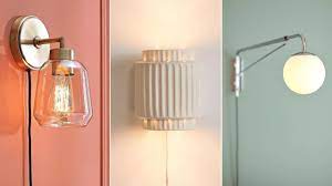 A black and brass swing arm wall lamp with an exposed bulb, the jib sconce is a handmade item made to order. Bright Finds 12 Plug In Wall Lights Under 100 Cbc Life