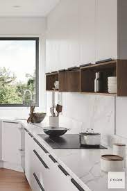 Break up an all white kitchen by adding color to your cabinets. Pin On Kitchen