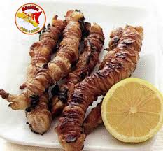 STIGGHIOLA La stigghiola  un tipico piatto della cucina siciliana e  palermitana, che ha come ingrediente base le budella (in particolare quelle  di agnello ma anche di capretto o di vitello), lavate