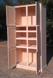 This beautiful stand alone kitchen cabinet works excellently for a traditional farm inspired or log cabin. Custom Made Freestanding Pantry Cabinet By Ambassador Woodcrafts Custommade Com