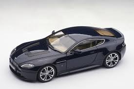 Image result for Midnight Blue 2010 Aston Martin