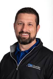 Can a 2SDK8 skid loader run a brush mower or post digger with a hydraulics  upgrade?