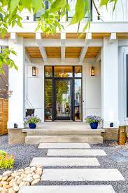 Houses with modern farmhouse exteriors have cozy, rustic farmhouse aesthetics with clean and sleek lines. Modern Farmhouse In Altadore Farmhouse Entry Calgary By Trickle Creek Designer Homes Houzz